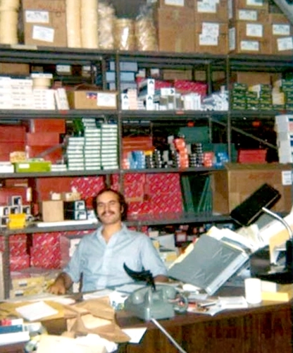Tom Bellia at his desk at Bellia and Sons, 1976